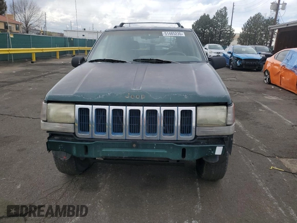 1996 Jeep Grand Cherokee Laredo with VIN 1J4GZ58S6TC165636, listed as a Copart auction lot 51485235 with 266,873 mi miles and Salvage Title. Bid and sale history available at carsss.com. Image 5.