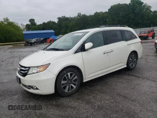 2014 Honda Odyssey Touring with VIN 5FNRL5H90EB113647, listed as a Copart auction lot 57916275 with 166,534 mi miles and Salvage title. Bid and sale history available at DreamBid. Image 1.