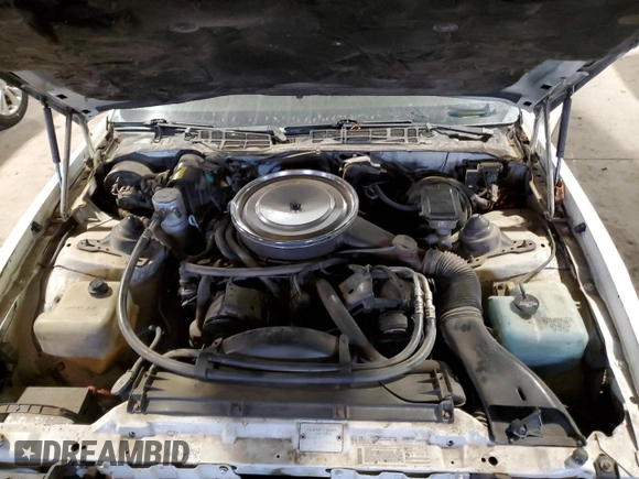 1984 Pontiac Firebird z VIN 1G2AS87H8EL260830, wystawiony jako Copart lot #84198714 z przebiegiem 95 966 mil mil oraz Szkoda całkowita • Salvage title. Historia ofert i sprzedaży dostępna na DreamBid. Obrazek 11.