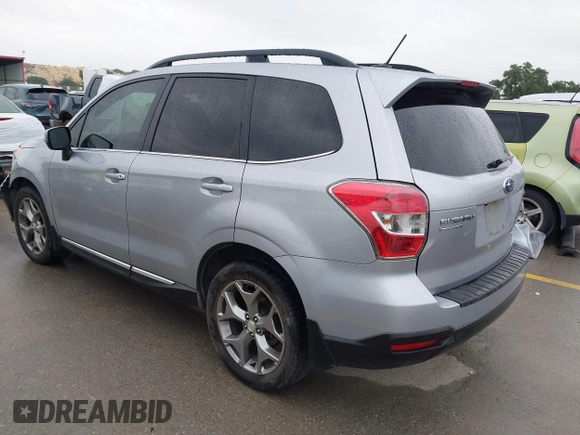 2015 Subaru Forester Touring with VIN JF2SJAUC8FH467730, listed as a IAAI auction lot 42403195 with 142,287 mi miles and . Bid and sale history available at DreamBid. Image 3.