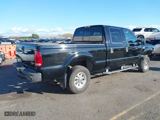 2002 Ford Super Duty F-250 XL with VIN 1FTNW21F22EB74368, listed as a IAAI auction lot 41636544 with 164,604 mi miles. Bid and sale history available at carsss.com. Image 4.