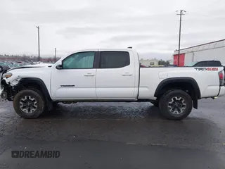 2021 Toyota Tacoma SR5 with VIN 3TMDZ5BN1MM100575, listed as a IAAI auction lot 41516274 with 61,974 mi miles and . Bid and sale history available at DreamBid. Image 15.