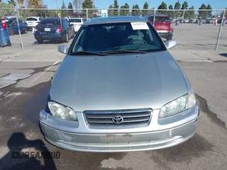 2001 Toyota Camry LE z VIN JT2BF22KX10342454, wystawiony jako IAAI lot #41939743 z przebiegiem 124 045 mil mil oraz . Historia ofert i sprzedaży dostępna na DreamBid. Obrazek 12.