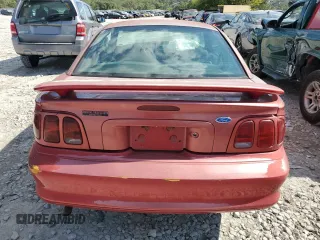 1996 Ford Mustang with VIN 1FALP4047TF117276, listed as a Copart auction lot 71978234 with 162,117 mi miles and Salvage Title. Bid and sale history available at carsss.com. Image 6.