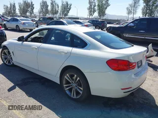 2017 BMW 4 Series 430i with VIN WBA4F7C31HG789340, listed as a IAAI auction lot 41871217 with 97,971 mi miles and . Bid and sale history available at DreamBid. Image 3.