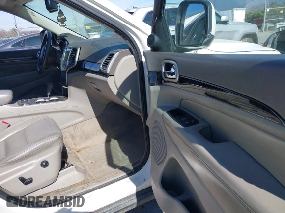 2012 Jeep Grand Cherokee Laredo with VIN 1C4RJFAT4CC229204, listed as a IAAI auction lot 41659491 with 141,143 mi miles. Bid and sale history available at carsss.com. Image 5.