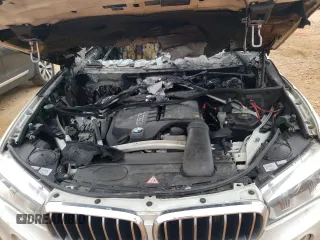 2016 BMW X5 sDrive35i z VIN 5UXKR2C53G0H42177, wystawiony jako Copart lot #51750125 z przebiegiem Nie podano mil oraz Szkoda całkowita • Salvage title. Historia ofert i sprzedaży dostępna na DreamBid. Obrazek 13.