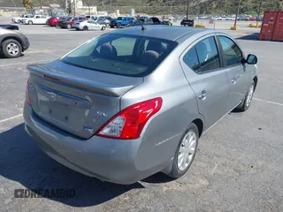 2014 Nissan Versa SV with VIN 3N1CN7AP9EL834221, listed as a IAAI auction lot 42161427 with 227,391 mi miles. Bid and sale history available at carsss.com. Image 4.