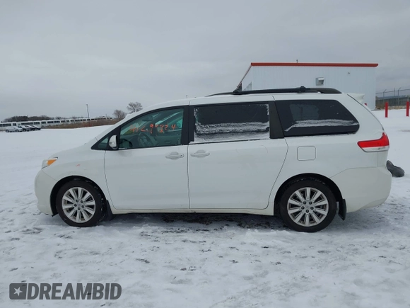 2013 Toyota Sienna XLE with VIN 5TDDK3DC2DS053559, listed as a IAAI auction lot 41299824 with 175,611 mi miles and . Bid and sale history available at DreamBid. Image 15.
