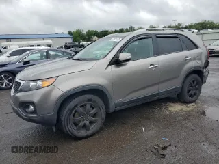 2011 Kia Sorento LX with VIN 5XYKTDA17BG096270, listed as a Copart auction lot 57023435 with 127,519 mi miles and Salvage title. Bid and sale history available at DreamBid. Image 1.