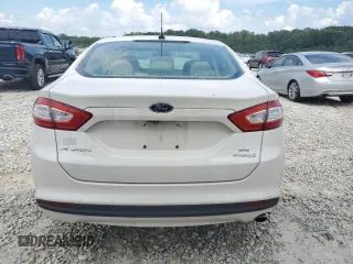 2014 Ford Fusion SE Hybrid with VIN 3FA6P0LU4ER363094, listed as a Copart auction lot 63460005 with 146,925 mi miles and Clean title. Bid and sale history available at DreamBid. Image 6.