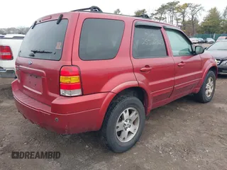 2005 Ford Escape Limited with VIN 1FMYU94155KA52665, listed as a IAAI auction lot 41736416 with 999,999 mi miles. Bid and sale history available at carsss.com. Image 4.