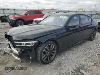 2022 BMW 7 Series with VIN WBA7U6C06NCK59421, listed as a Copart auction lot 80159874 with 24,033 mi miles and Salvage title. Bid and sale history available at DreamBid. Image 1.