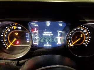 2021 Jeep Wrangler Unlimited Sport S с VIN 1C4HJXDG1MW761204, выставлен на аукционе Copart как лот 89063655 с пробегом 117 490 миль миль и Списание • Salvage title. История ставок и продаж доступна на DreamBid. Изображение 9.