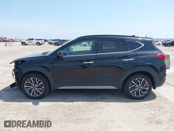 2021 Hyundai Tucson Ultimate with VIN KM8J33ALXMU289579, listed as a IAAI auction lot 42027719 with 95,989 mi miles and . Bid and sale history available at DreamBid. Image 14.
