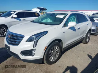2017 Cadillac XT5 Luxury FWD with VIN 1GYKNBRS1HZ304062, listed as a IAAI auction lot 42460981 with 77,310 mi miles and . Bid and sale history available at DreamBid. Image 2.
