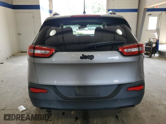 2017 Jeep Cherokee Altitude with VIN 1C4PJLABXHW586048, listed as a Copart auction lot 62674745 with 106,334 mi miles and Salvage title. Bid and sale history available at DreamBid. Image 6.