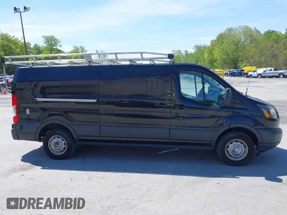 2015 Ford Transit Cargo z VIN 1FTBW2YG7FKA20201, wystawiony jako IAAI lot #42253463 z przebiegiem 83 235 mil mil oraz . Historia ofert i sprzedaży dostępna na DreamBid. Obrazek 13.