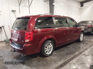 2019 Dodge Grand Caravan SXT with VIN 2C4RDGCG9KR678235, listed as a IAAI auction lot 41864931 with 127,848 mi miles and . Bid and sale history available at DreamBid. Image 4.