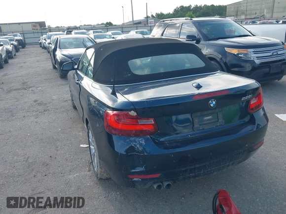 2015 BMW 2 Series 228i with VIN WBA1K5C58FV473737, listed as a IAAI auction lot 42383363 with Not provided miles and . Bid and sale history available at DreamBid. Image 3.