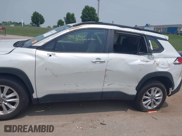 2023 Toyota Corolla Cross LE with VIN 7MUCAABG5PV070262, listed as a IAAI auction lot 42347876 with 24,449 mi miles and . Bid and sale history available at DreamBid. Image 6.