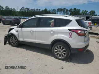 2018 Ford Escape Titanium with VIN 1FMCU0J99JUA06741, listed as a Copart auction lot 55782195 with 103,392 mi miles and Salvage title. Bid and sale history available at DreamBid. Image 2.