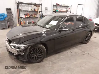 2018 BMW 3 Series 320i xDrive with VIN WBA8E5G5XJNU46855, listed as a IAAI auction lot 41526290 with 68,720 mi miles. Bid and sale history available at carsss.com. Image 2.