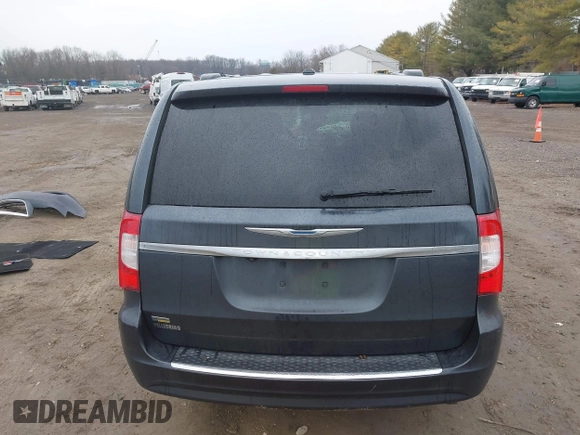 2014 Chrysler Town & Country Touring with VIN 2C4RC1BG6ER348090, listed as a IAAI auction lot 41687678 with 140,192 mi miles. Bid and sale history available at carsss.com. Image 16.