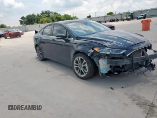 2020 Ford Fusion SEL z VIN 3FA6P0CD5LR168103, wystawiony jako Copart lot #62559935 z przebiegiem 60 240 mil mil oraz Szkoda całkowita • Salvage title. Historia ofert i sprzedaży dostępna na DreamBid. Obrazek 4.