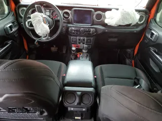 2018 Jeep Wrangler Unlimited Rubicon with VIN 1C4HJXFG7JW287624, listed as a Copart auction lot 59006895 with 64,871 mi miles and Salvage title. Bid and sale history available at DreamBid. Image 8.