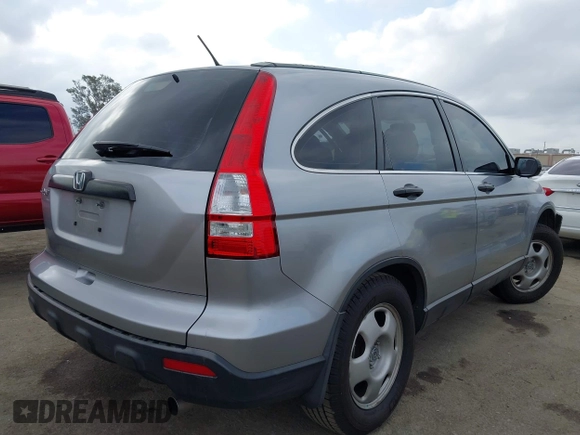 2007 Honda CR-V LX with VIN JHLRE38397C020722, listed as a IAAI auction lot 42100516 with 161,561 mi miles. Bid and sale history available at carsss.com. Image 4.