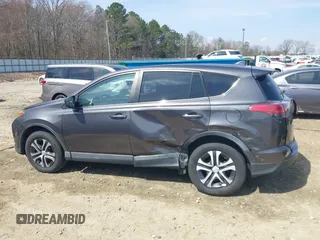 2017 Toyota RAV4 LE with VIN 2T3ZFREV9HW390859, listed as a IAAI auction lot 41802727 with 167,085 mi miles and . Bid and sale history available at carsss.com. Image 14.