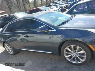 2013 Cadillac XTS Premium with VIN 2G61S5S33D9113653, listed as a IAAI auction lot 41837117 with 101,049 mi miles and . Bid and sale history available at DreamBid. Image 12.