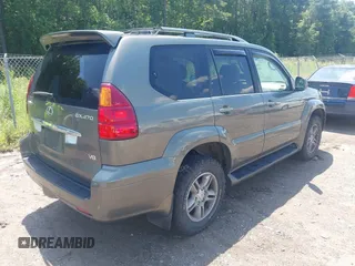2006 Lexus GX 470 with VIN JTJBT20X560108967, listed as a IAAI auction lot 42702608 with 239,835 mi miles and . Bid and sale history available at DreamBid. Image 4.
