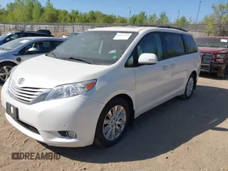 2014 Toyota Sienna Limited with VIN 5TDDK3DC2ES089477, listed as a IAAI auction lot 42217213 with 182,616 mi miles and . Bid and sale history available at DreamBid. Image 2.
