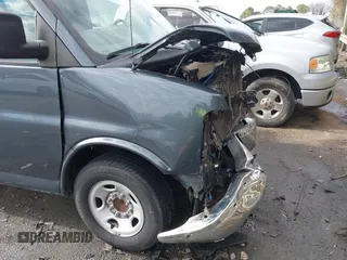 2014 Chevrolet Express Passenger LT z VIN 1GAZG1FG4E1177819, wystawiony jako IAAI lot #41422904 z przebiegiem 97 357 mil mil oraz . Historia ofert i sprzedaży dostępna na DreamBid. Obrazek 19.