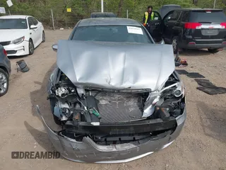 2013 Chrysler 200 Limited with VIN 1C3CCBCG3DN655565, listed as a IAAI auction lot 42059383 with 100,149 mi miles and . Bid and sale history available at DreamBid. Image 12.