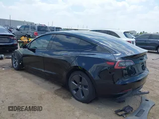 2023 Tesla Model 3 with VIN 5YJ3E1EA8PF454210, listed as a IAAI auction lot 42326822 with 43,200 mi miles and . Bid and sale history available at DreamBid. Image 3.