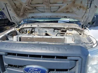 2014 Ford F-250 XL with VIN 1FT7X2B60EEB08149, listed as a IAAI auction lot 37607954 with Not provided miles and . Bid and sale history available at DreamBid. Image 6.