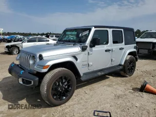 2023 Jeep Wrangler Sahara with VIN 1C4JJXP67PW608366, listed as a Copart auction lot 42828495 with 2,876 mi miles and Non Repairable. Bid and sale history available at DreamBid. Image 1.
