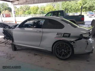 2020 BMW M2 Competition with VIN WBS2U7C01L7F87723, listed as a IAAI auction lot 40319156 with 55,309 mi miles. Bid and sale history available at carsss.com. Image 15.