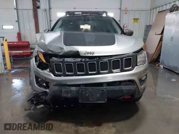 2019 Jeep Compass Trailhawk with VIN 3C4NJDDB9KT765459, listed as a IAAI auction lot 41319891 with 83,860 mi miles and . Bid and sale history available at carsss.com. Image 13.