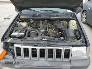 1996 Jeep Grand Cherokee with VIN 1J4EZ58S8TC106529, listed as a Copart auction lot 50163965 with 226,951 mi miles and Salvage title. Bid and sale history available at DreamBid. Image 11.