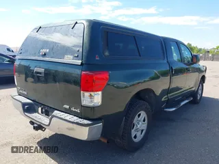 2010 Toyota Tundra z VIN 5TFUW5F11AX103188, wystawiony jako IAAI lot #39811998 z przebiegiem 198 948 mil mil oraz . Historia ofert i sprzedaży dostępna na DreamBid. Obrazek 4.