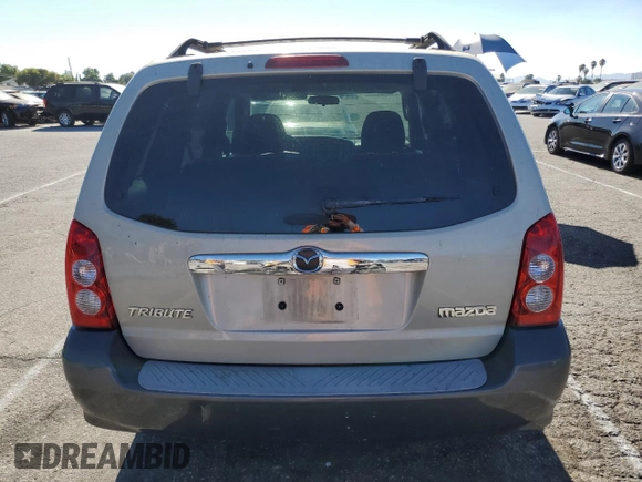 2005 Mazda Tribute i with VIN 4F2YZ02Z85KM31234, listed as a Copart auction lot 68669434 with 211,921 mi miles and Salvage Title. Bid and sale history available at carsss.com. Image 6.