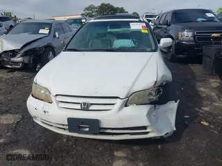 2002 Honda Accord Sdn EX with VIN JHMCG56632C004934, listed as a IAAI auction lot 41595113 with 298,868 mi miles. Bid and sale history available at carsss.com. Image 12.