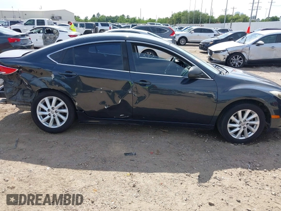 2012 Mazda 6 i Touring with VIN 1YVHZ8DH7C5M29077, listed as a IAAI auction lot 42236370 with 193,258 mi miles and . Bid and sale history available at DreamBid. Image 14.