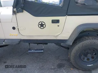 1995 Jeep Wrangler S z VIN 1J4FY19P7SP242989, wystawiony jako IAAI lot #42241996 z przebiegiem 203 520 mil mil oraz . Historia ofert i sprzedaży dostępna na DreamBid. Obrazek 6.