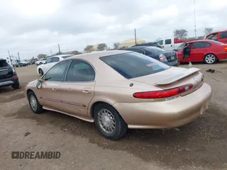 1997 Mercury Sable LS z VIN 1MELM53S8VA602057, wystawiony jako IAAI lot #41468005 z przebiegiem 71 203 mil mil oraz . Historia ofert i sprzedaży dostępna na DreamBid. Obrazek 14.
