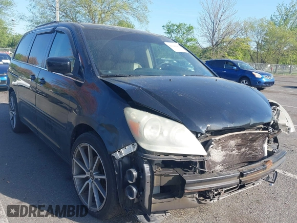 2007 Honda Odyssey EX-L with VIN 5FNRL386X7B128430, listed as a IAAI auction lot 42146089 with 231,059 mi miles and . Bid and sale history available at DreamBid. Image 1.